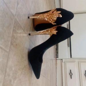 Black and gold heels.